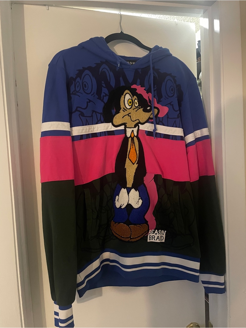 Reason Multicolor Cartoon Patch Hoodie in Blue, Pink & Black
